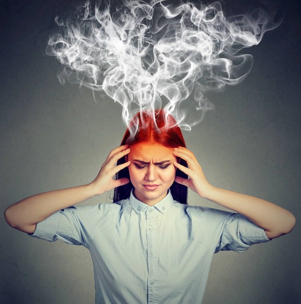 Woman thinks very intensely having headache  - Фото, зображення