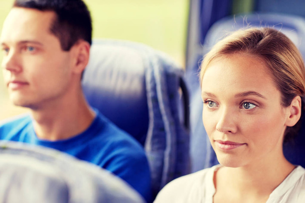 happy young woman sitting in travel bus or train - Photo, image