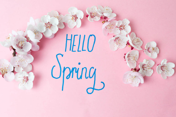 Hello spring note with cherry blossom flowers - Photo, Image