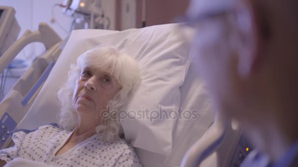 Elderly patient speaks with the doctor - Footage, Video