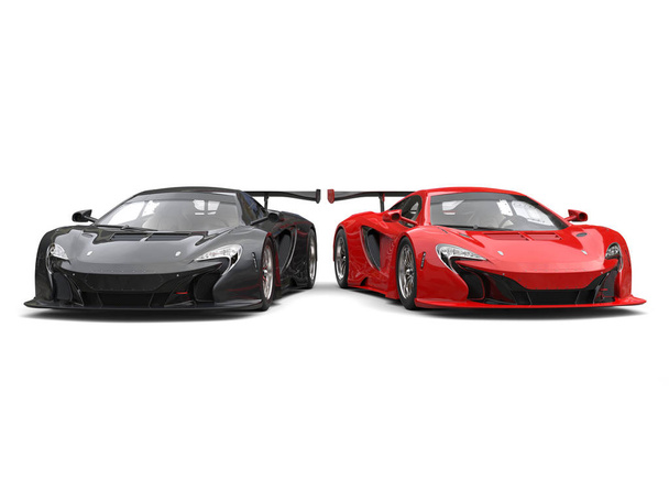 Fekete és piros félelmetes supercars egymás mellett - Fotó, kép