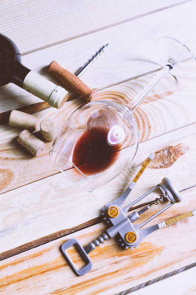 Wine glass, corks and corkscrew - 写真・画像