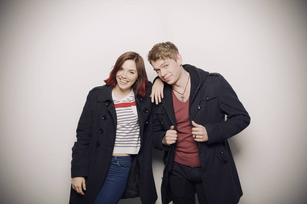 Happy young couple in winter clothes - Foto, imagen