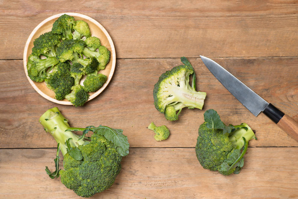 green broccoli on wooden background  - Fotografie, Obrázek