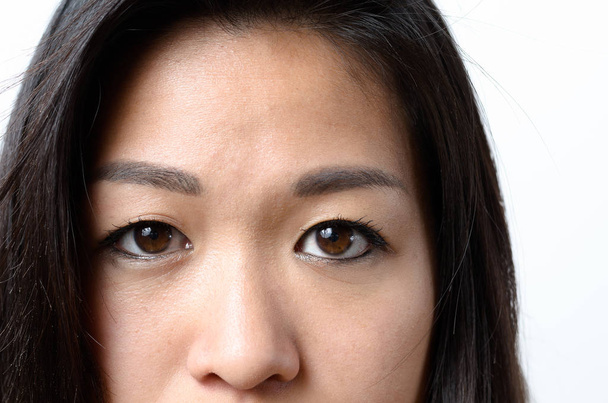 Fiatal ázsiai nő szeme - Fotó, kép