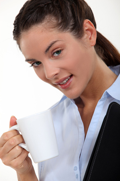 Businesswoman with a hot drink - Fotó, kép