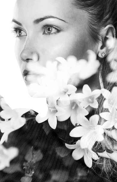 Monochrome double exposure of beautiful girl looking aside and flowers - Φωτογραφία, εικόνα