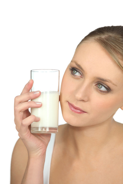 Woman with a glass of milk - Zdjęcie, obraz
