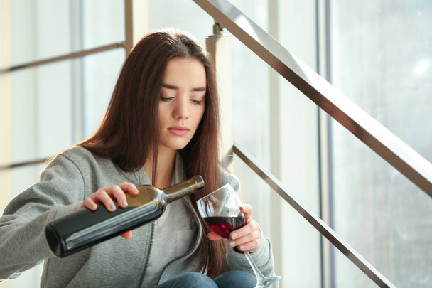 Depressed woman drinking wine  - Zdjęcie, obraz