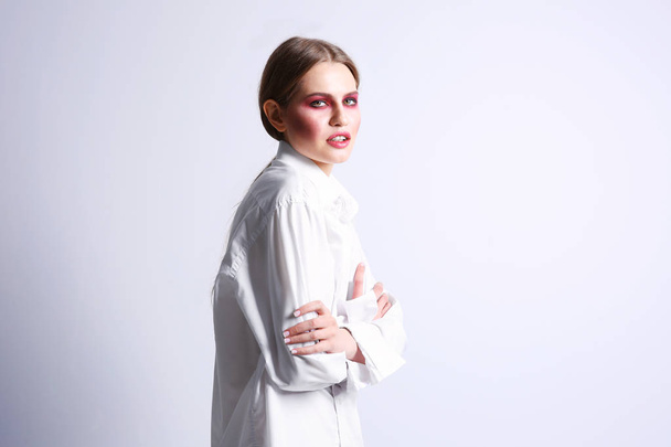 Young model with creative makeup - Fotografie, Obrázek