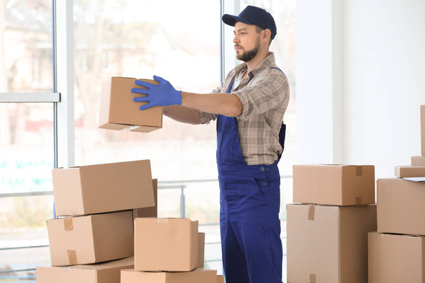 man moving boxes  - Fotó, kép
