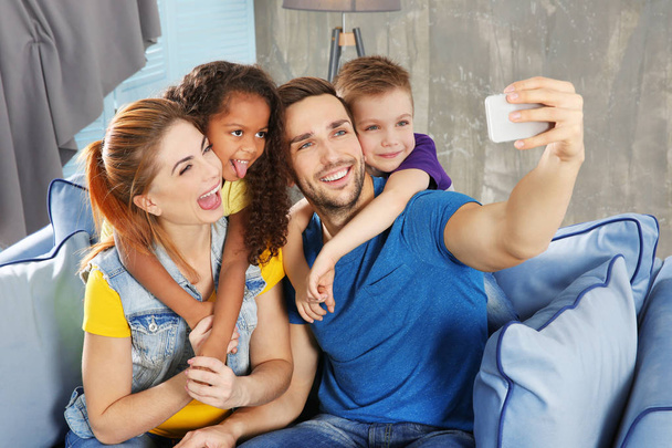 Happy family making selfie - Фото, изображение