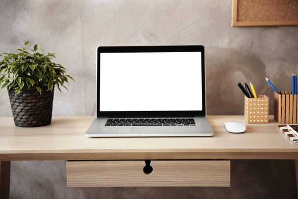 Modern workplace with laptop - Foto, Bild