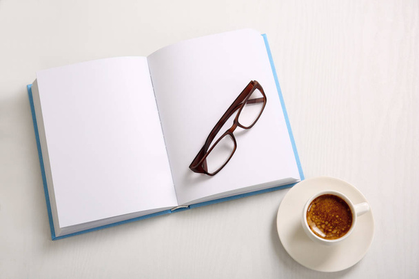 book and cup of coffee  - 写真・画像