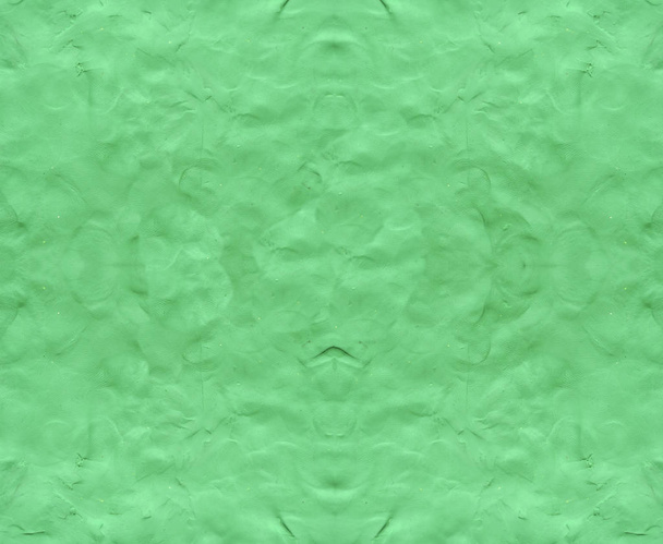Groene achtergrond met vingerafdrukken - Foto, afbeelding