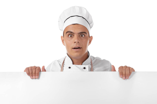 Young handsome chef cook isolated on white - Foto, imagen