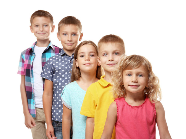 Cute children standing in a row on white background - Фото, изображение
