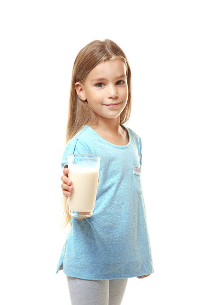 Cute little girl holding glass of milk isolated on white - Foto, Imagem