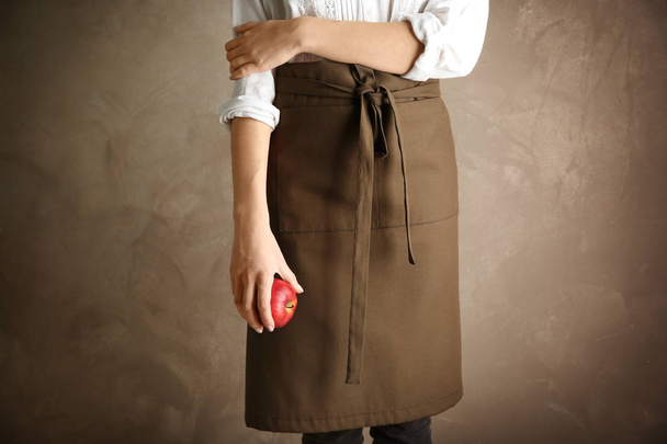 Woman wearing apron  - 写真・画像