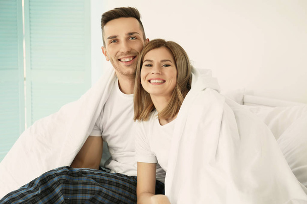 Young cute couple in bed  - Foto, Bild
