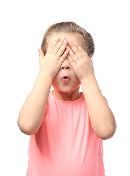 little girl covering eyes with hands - Photo, image