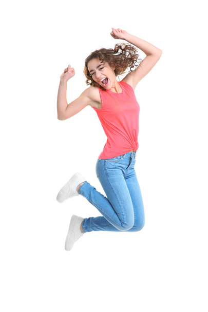Joyful young woman jumping   - Foto, Imagen