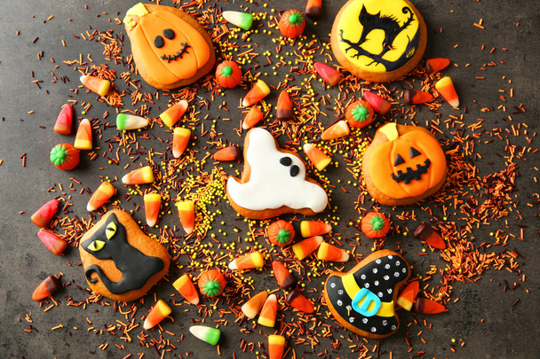 Halloween cookies and jelly sweets  - Фото, изображение