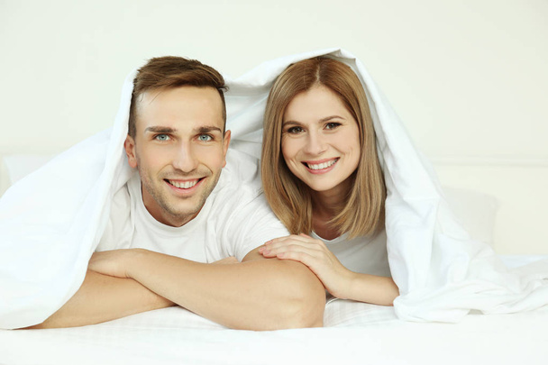 Young cute couple in bed  - Fotoğraf, Görsel