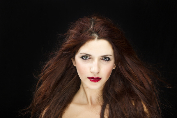 sensual brunette woman with shiny hair - 写真・画像