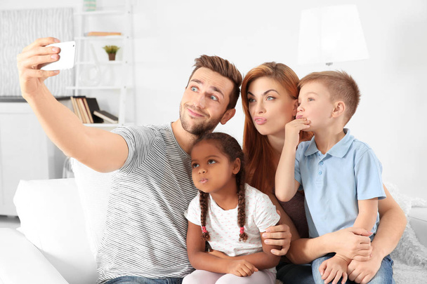 Happy family making selfie  - Fotó, kép