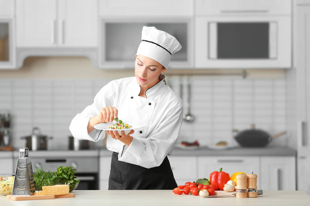 Female chef in kitchen - Foto, Imagem