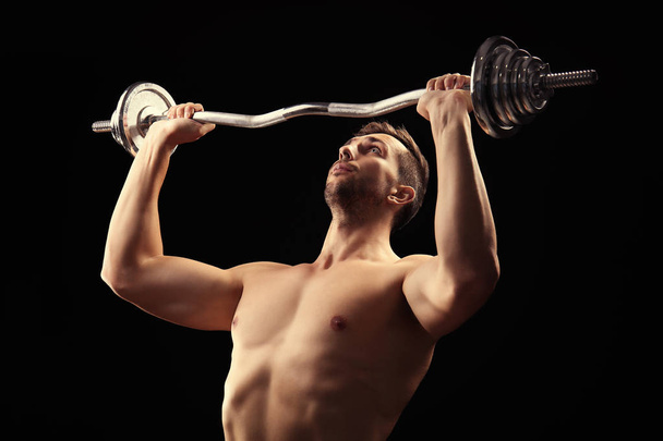 Sporty man doing exercises - Foto, Imagem