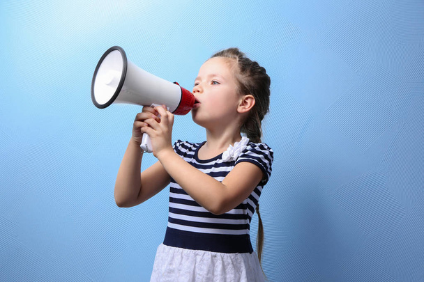 Cute little girl with megaphone - Photo, Image