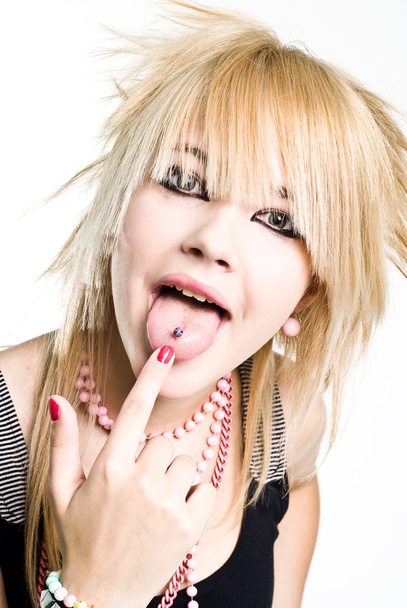 Emo girl showing her piercing - Photo, image