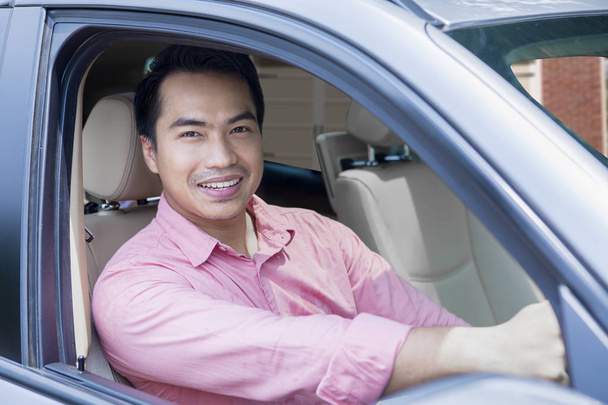 Asian man driving his car - Φωτογραφία, εικόνα