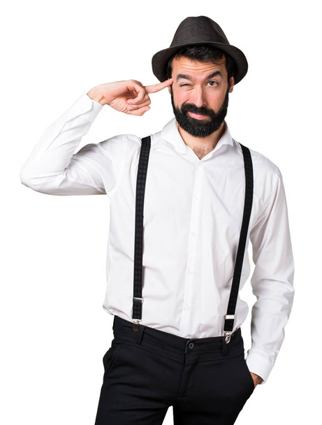 Hipster man with beard making crazy gesture - 写真・画像