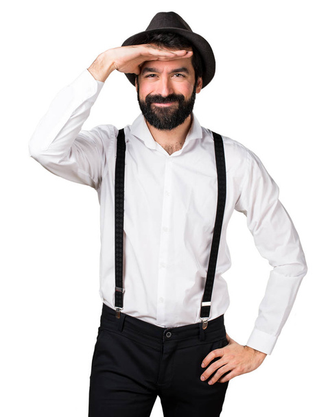 Hipster man with beard showing something - Φωτογραφία, εικόνα