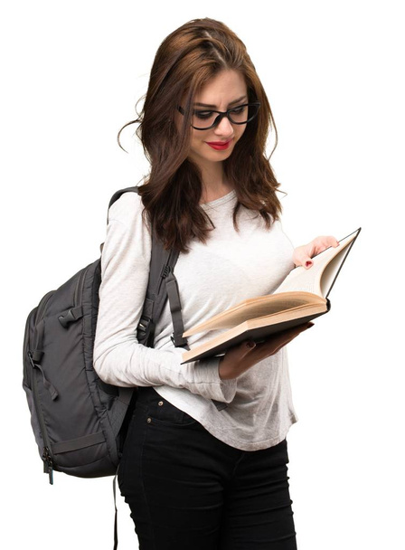 Студентська жінка читає книгу
 - Фото, зображення