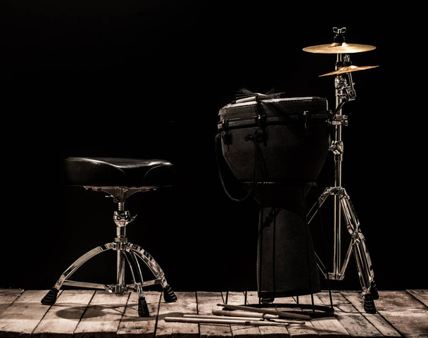 musical percussion instruments on black background - Photo, Image