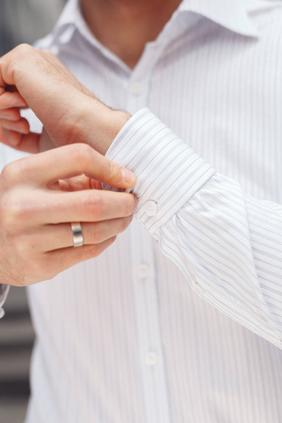 Close up of a hand businessman how wears white shirt - Fotoğraf, Görsel
