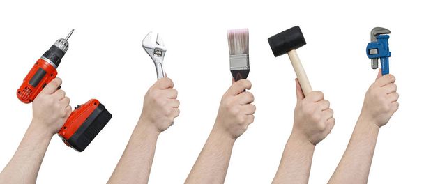 Screwdriver, Spanner, Paintbrush, Mallet, and Ruler in Hands Cli - Photo, Image