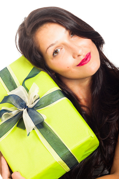 Attractive happy woman holding gift - Фото, зображення