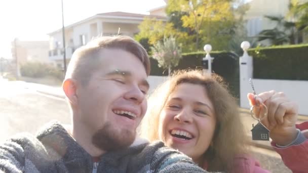 Young Couple Standing Outside Home - Video, Çekim