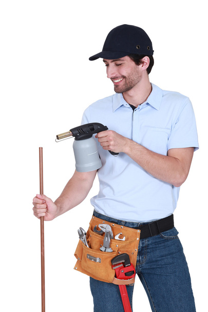 Plumber with jug in hand - Фото, зображення