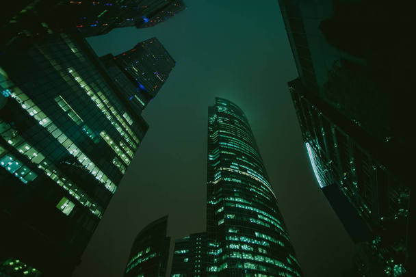 Skyscrapers at night - Фото, изображение