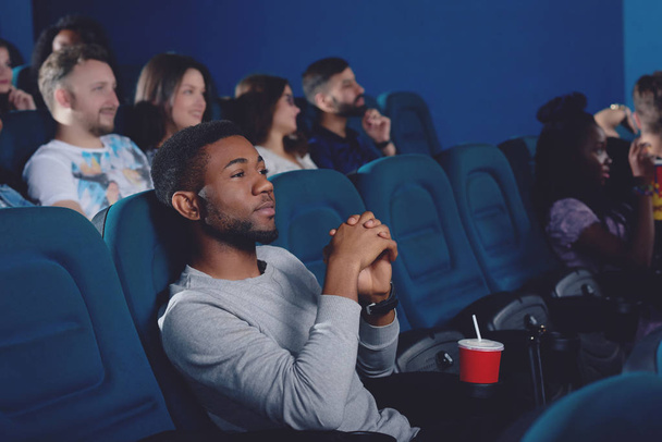 African man watching movie in 3d glasses. - Foto, imagen