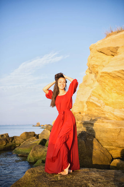 Beautiful young girl in red dress - Zdjęcie, obraz
