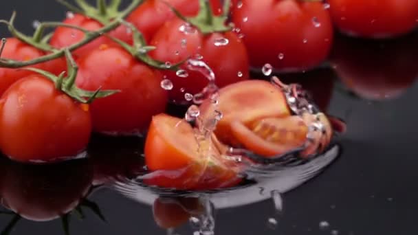 Slices of Ripe Tomato Falls on the Table. - Video, Çekim