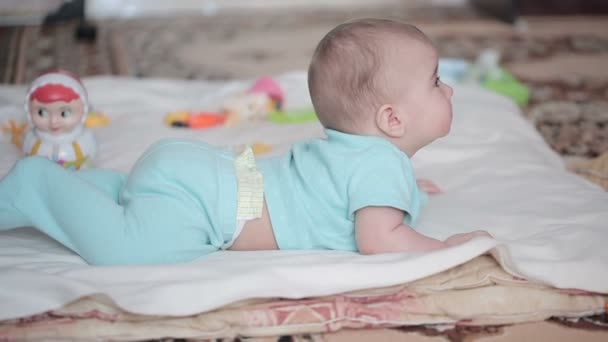 Small happy baby on the carpet. - Video, Çekim