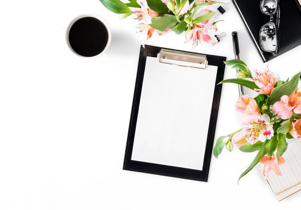 Female workspace with clipboard, office accessories, coffee and  - Photo, image